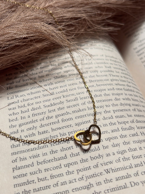 Intertwined hearts pendant