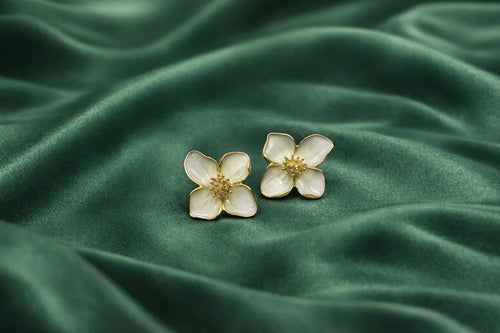 White floral studs