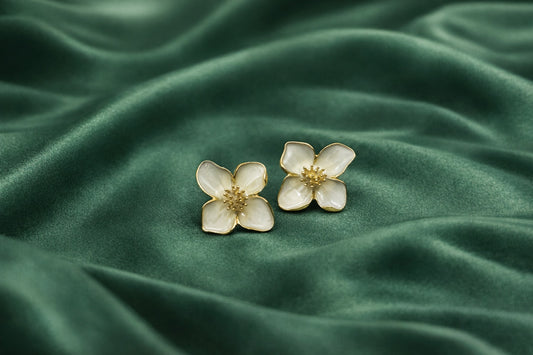 White floral studs