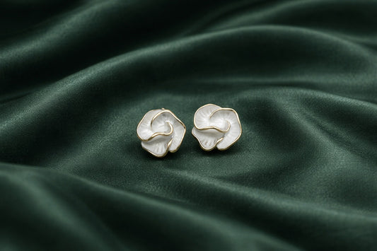 White swirl floral studs