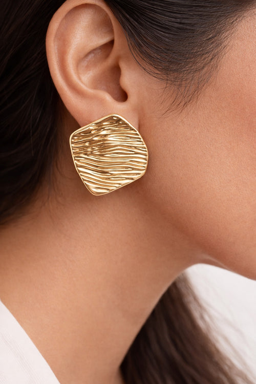 Textured gold statement earrings